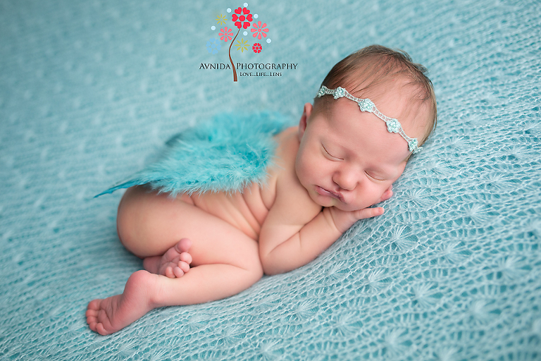 West Orange NJ newborn photographer- We weren't aware that angels had blue wings too - Well now we know thanks to a little angel names Aeris -cute newborn photography by Avnida Photography