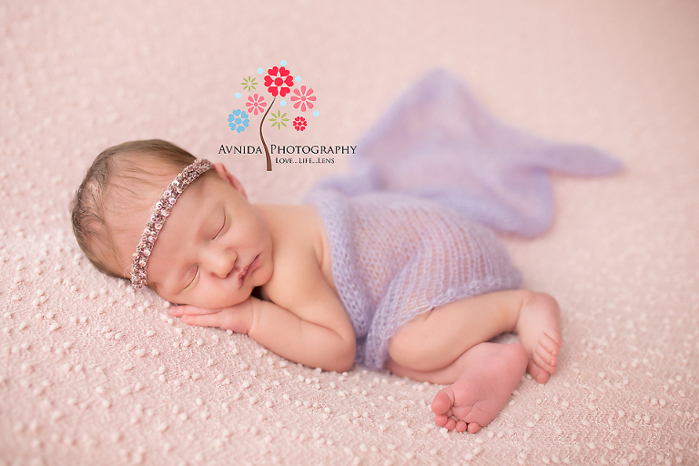 West Orange NJ newborn photographer- the combination of lavender and light pink cannot be beat especially when used with a cutie like Aeris - the best NJ newborn photographers