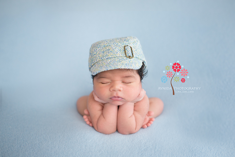 Verona NJ newborn photographer - Officer Marcos reporting for duty striking the perfect Froggie newborn pose