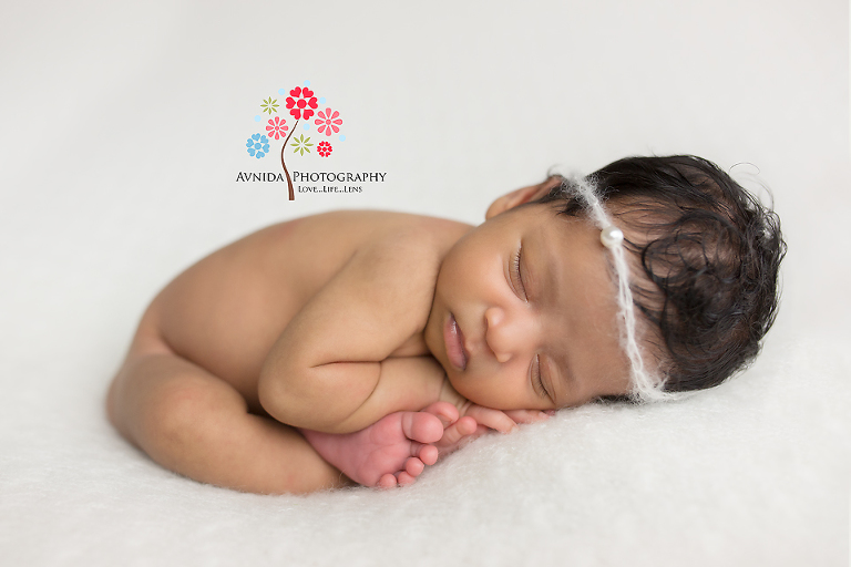 Edgewater NJ newborn and maternity photographer - And here comes an impressive side curl pose - way to go little girlie