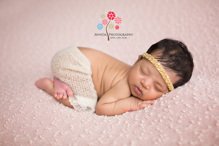 Edgewater NJ newborn and maternity photographer - It's tough to pull off a golden headband but no sweat for this little cutie