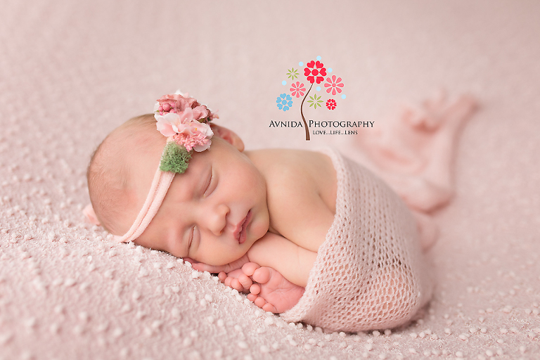 River Vale NJ newborn photographer - Love the combination of peach blanket and peach flower on this beautiful angel