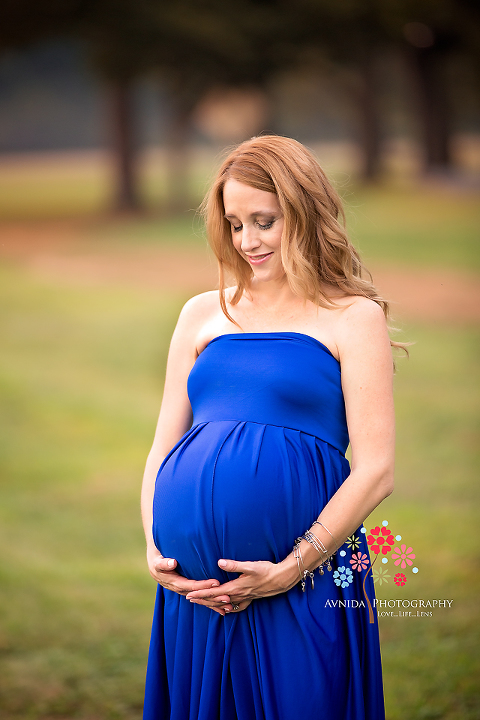 Verona NJ Maternity Photographer - Just love the colors in this photograph - the blue that just adds to mom-to-be's beautiful brown hair with the lush green park.jpg