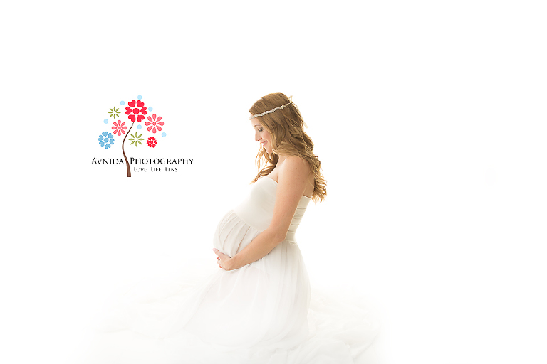 Bloomfield NJ Maternity Photographer - The headband, the lighting, the flowing hair and what a beautiful smile - this photograph is so dreamy