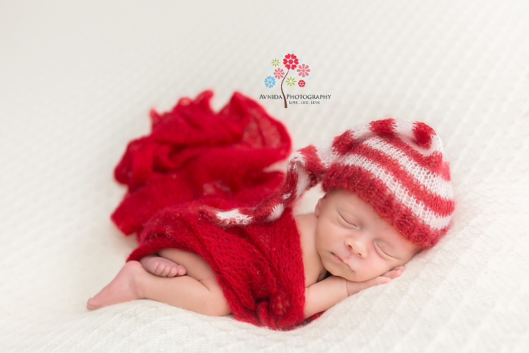 twin newborn photography - The perfect shot for Santa's Elf