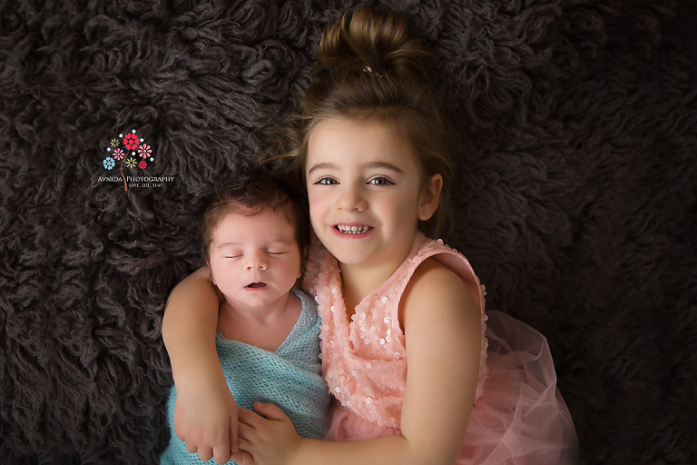 Newborn Photographer Somerset NJ - how you sleep so peacefully knowing your big sister is next to you