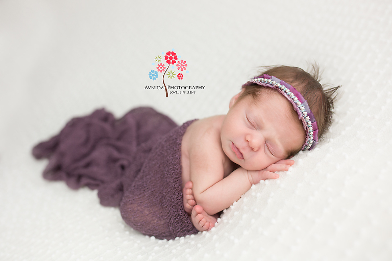 Hoboken NJ Newborn Photographer - The joy with neutral colors is that a good contrast (like purple against white) can really bring out the innocence and true beauty of a newborn