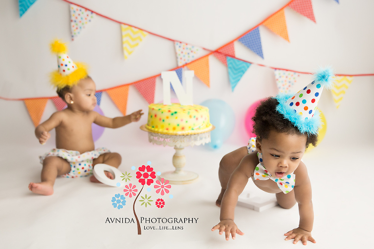 First Birthday Cake Smash for Twins - Wait let me get something to help us take care of the cake.
