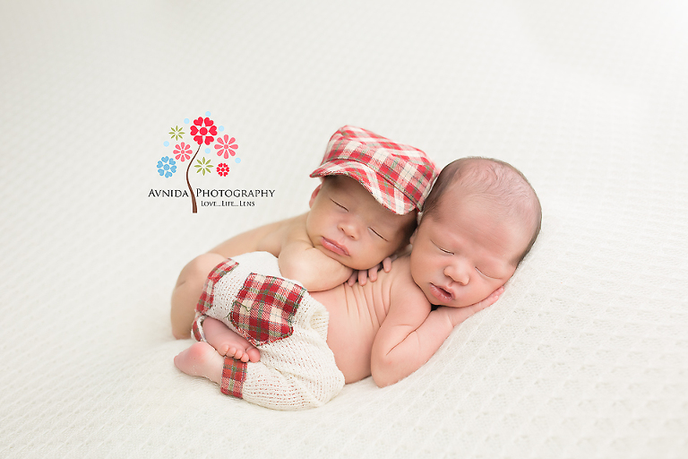 Newborn Photographer Morris County NJ - Even if one of them wakes up, wears a cap, and then heads back to sleep again :P