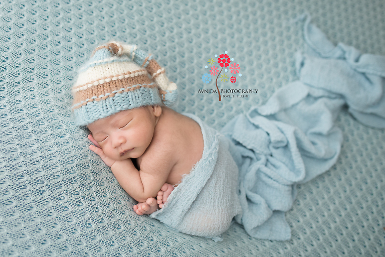 Newborn Photography Bound Brook NJ - Creating a sea of blue. The art of mixing colors for a newborn photography session.
