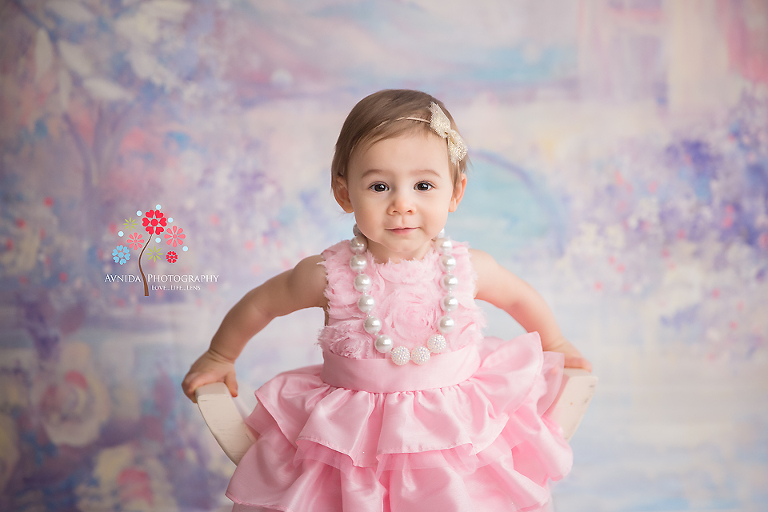 Cake Smash Photography Far Hills NJ - The princess learns early on how to sit on a throne.