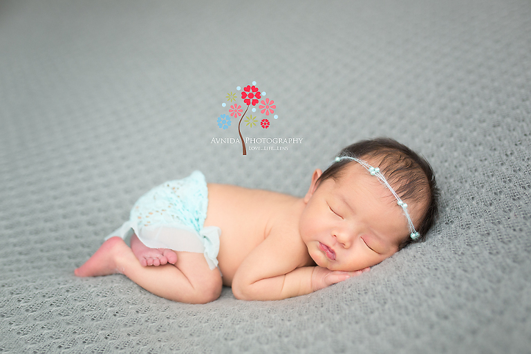 This is why you need to keep shopping for newborn clothes. So you can get the best newborn photography NJ poses and photos. Baby Huong's Newborn Photography Montgomery NJ session.