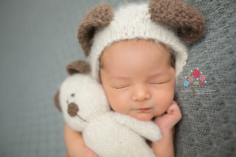 How the best newborn photographer NJ can get a baby to smile even when she is sleeping - Baby Huong's Newborn Photography Montgomery NJ session