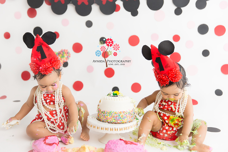 Cake Smash Photography Lawrenceville NJ - Isn't this just cute - the same pose, the same level of attention to the task at hand, and the smashing the cake that dad brought over