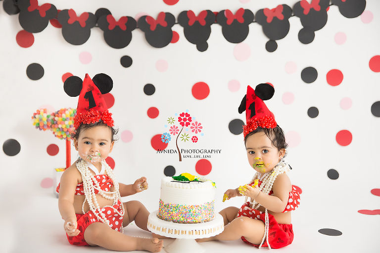 Cake Smash Photography Lawrenceville NJ - Ready, set, go - The sisters take a quick second away from their extremely important task at hand to look at the camera