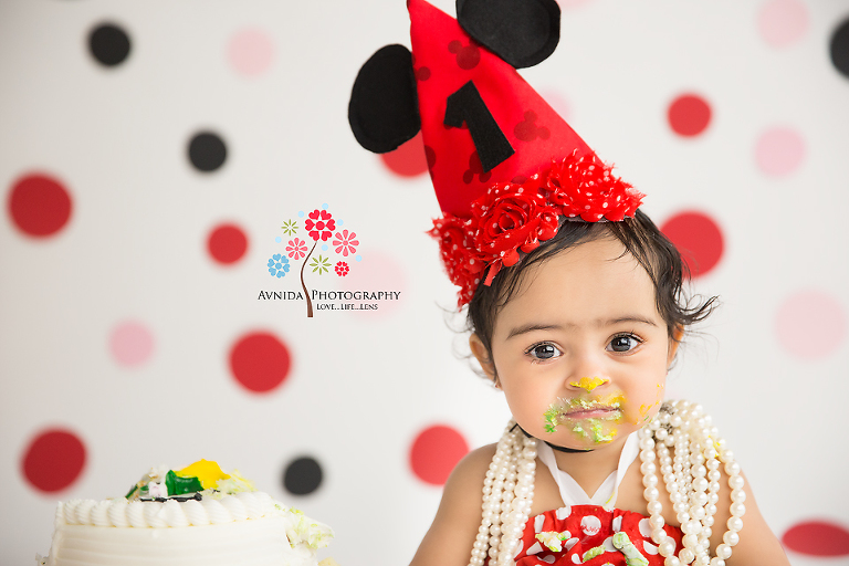 Cake Smash Photography Lawrenceville NJ- She tried to look all innocent and cute but we found out that she had done - well, the evidence was staring us in the face