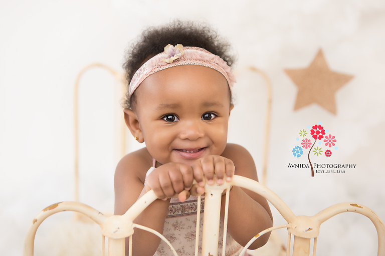 Cake Smash Photography Edison NJ - Is that not just the cutest pose - This cutie pie was a natural at posing for her first birthday cake smash pictures - photos by Avnida Photography