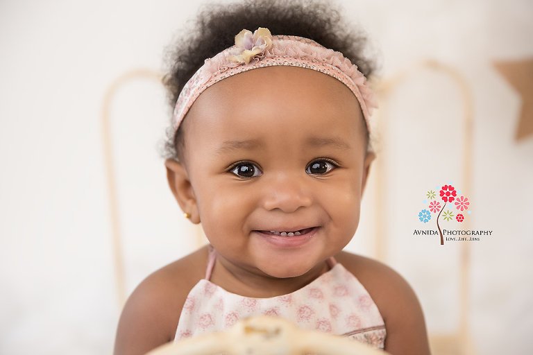 Cake Smash Photography Edison NJ - There is something about Morgan that just makes you smile with her - She stands with her hands back and gives you that perfect little smile