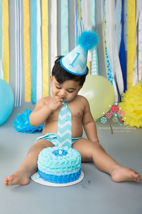 Cake Smash Photography Avalon NJ - Not that I want to spoil the arrangement, after all it looks so beautiful but let me take a quick taste - Best Cake Smash Photography by Avnida
