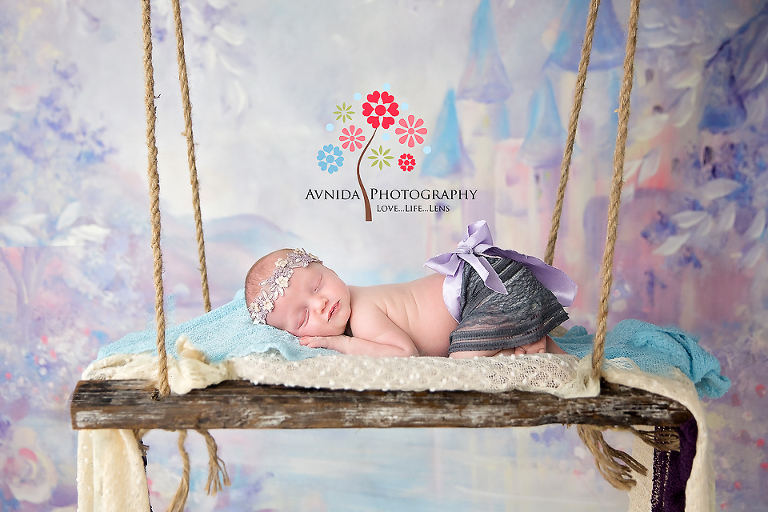 Newborn Photography Somerset County NJ - From the black and white photography to one full of vibrant colors - Baby Kaylee sleeps peacefully on her custom swing