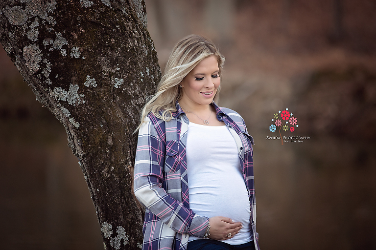 Maternity Photography Bergen County NJ - Just love the contrast of the colors in this photograph - the hues of brown in the background, the subtlety of the darker colors contrasted against the white