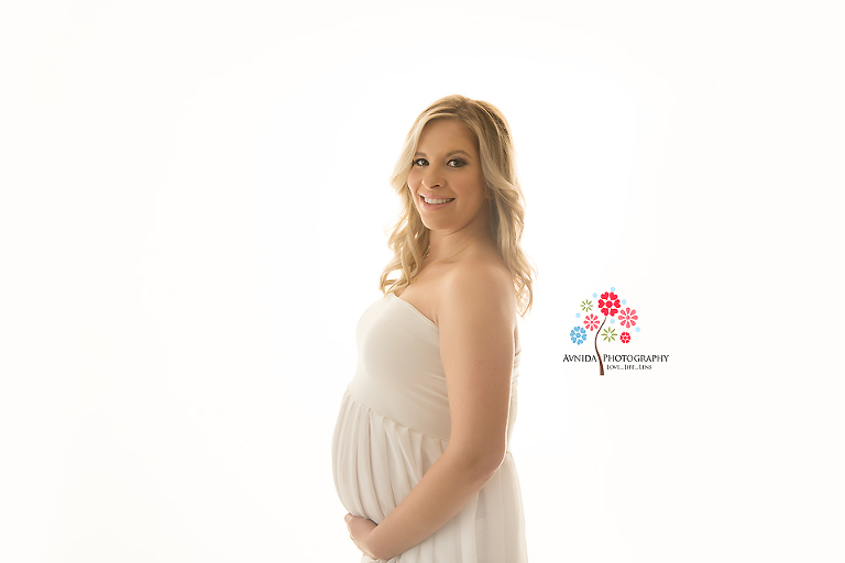 Maternity Photography Bergen County NJ - This is what white and the lighting in the studio brings out - nothing in the focus but the beauty of a mama-to-be