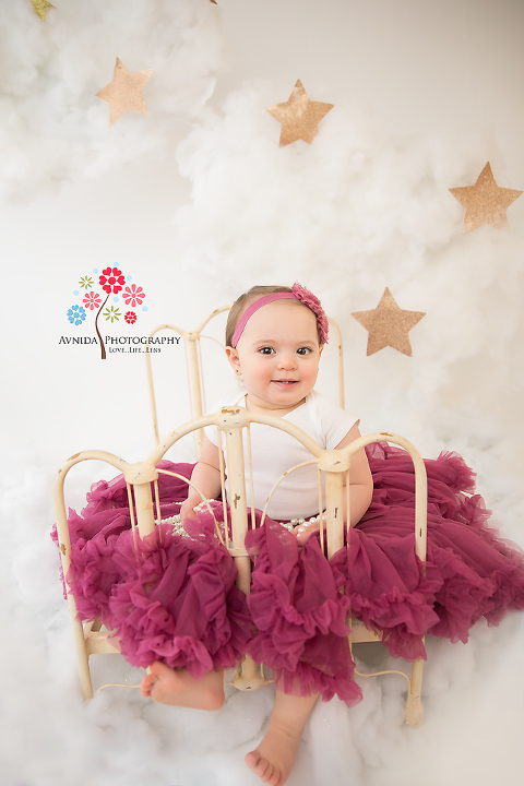 Cake Smash Photography Tewksbury NJ - And of course the mischief starts shining through that smile - the stars, the cloud all come together for this perfect moment