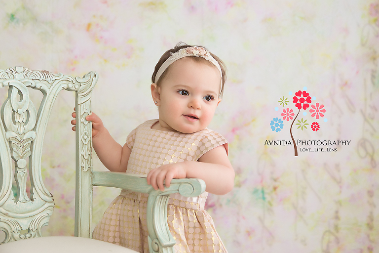 Cake Smash Photography Tewksbury NJ - Didn't I tell you that this little girl is a natural model - we just gave her the chair and this model turns it into the perfect prop