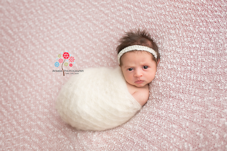 Newborn Photography Madison NJ - From the cute, innocent, sad expression to the angry young girl - almost like she's saying you want a piece of me