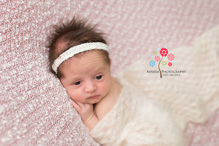 Newborn Photography Madison NJ - This little girl was the queen of expressions - this is another one of those cute innocent yet sad expressions that just makes you melt