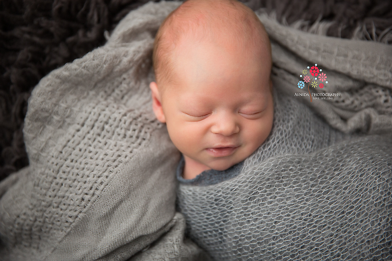 Newborn Photography Hillsborough NJ - Ah that hint of a smile in his expression - charming isn't when you see a subtle expression like that - the mark of a true gentleman