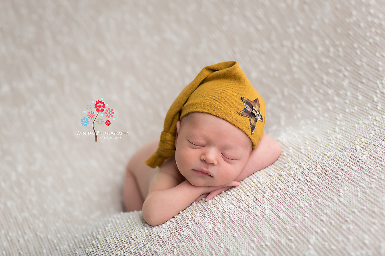 Newborn Photography Hillsborough NJ - I loved this expression - Owen looks calm, relaxed and just in his comfort zone in this photo - who said a simple pose cannot be beautiful