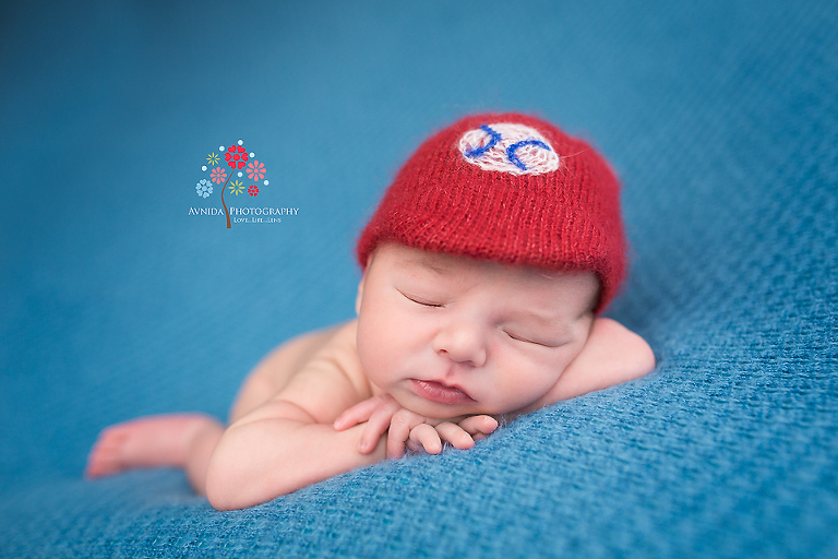 Newborn Photography Englewood Cliffs NJ - Like this one, two colors that contrast really effectively with each other and not to mention that dad is a big baseball fan