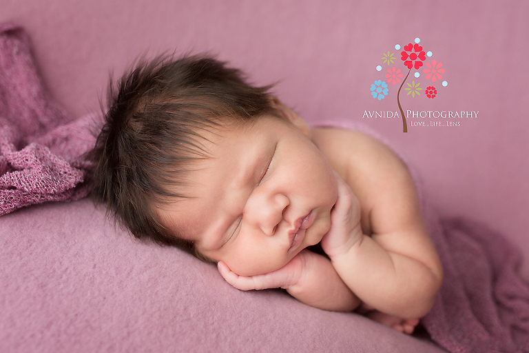 Newborn Photography Paterson NJ - A close up of the side lying pose to show those cute cheeks and the beautiful hair this little girl had - thank you Baby Emma - you made my day