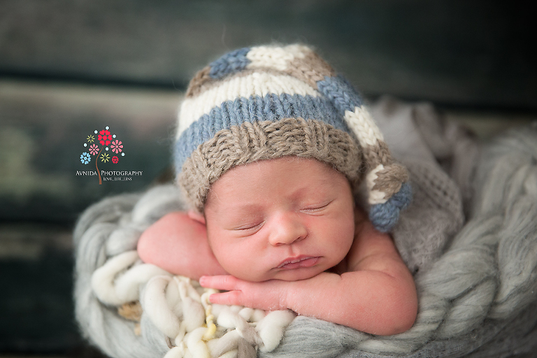 Newborn Photography Englewood NJ - A newborn who sleeps like a log and gives you awesome expressions - what could be better than that