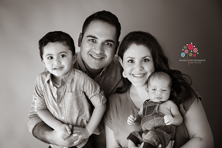 Newborn Photography Englewood NJ - Another timeless classic - I just cannot say enough about this photo - the family is all smiles and excited - beautiful, just beautiful