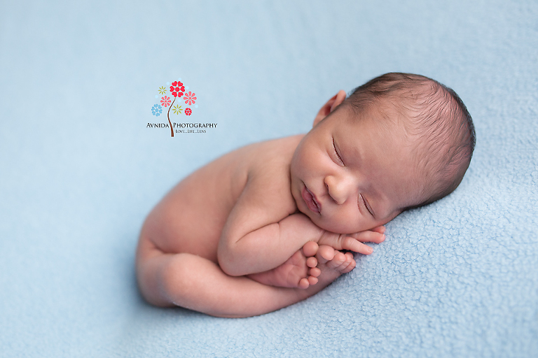 Newborn Photography Englewood NJ - There is something calm, serene and just relaxing about these pastel colors that helps focus the photo on the cute newborns