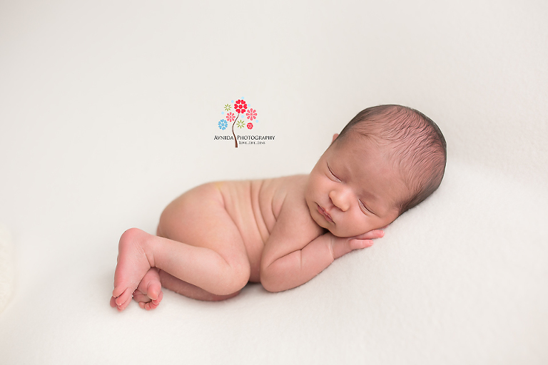 Newborn Photography Englewood NJ - This pose with the white color blanket is a timeless classic - styles may come and go but this will stay awesome forever
