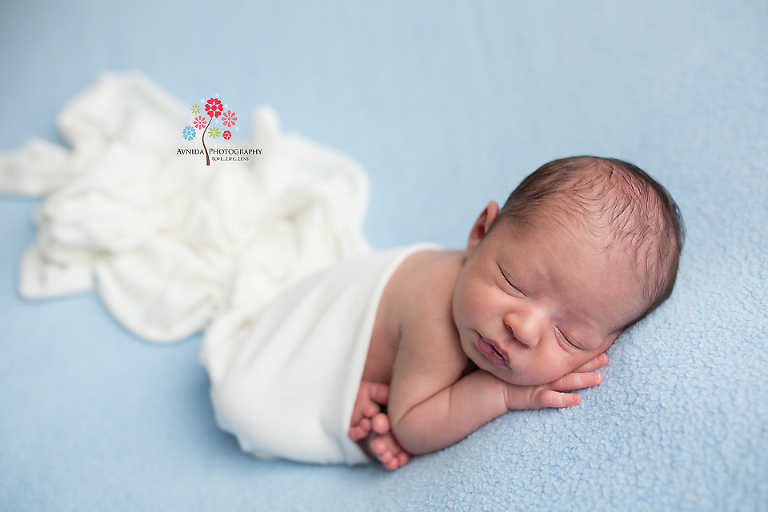 Newborn Photography Englewood NJ - When you have two awesome things how can you make it even better - it is simple isn't it - you combine them together to create something magical - like blue and white - clouds in the sky is what I call this photo