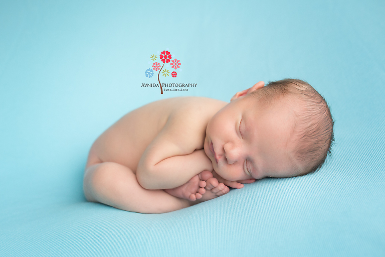 Newborn Photographer Teaneck NJ - Do you see that expression on his face - the 'I am sleeping so calmly you will feel guilty for disturbing my sleep' look that is just awesome