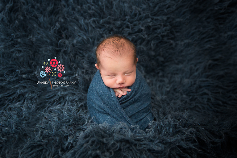 Newborn Photographer Teaneck NJ - If this is not the perfect definition of the phrase 'my little bundle of joy' then I don't know what is - Baby Borrel just nails this pose