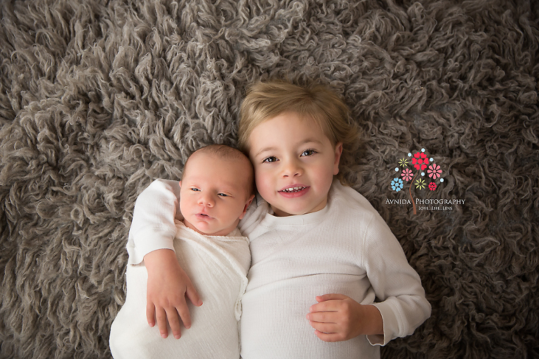 Newborn Photography Teaneck NJ - With the elder brother and once again we want to focus on the expression of their expressions so back to the white here folks