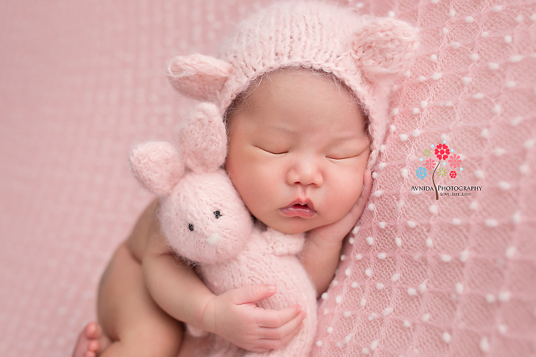 Newborn Photography Lawrenceville NJ - One cute bunny hugs another, and both have an equally cute set of cheeks
