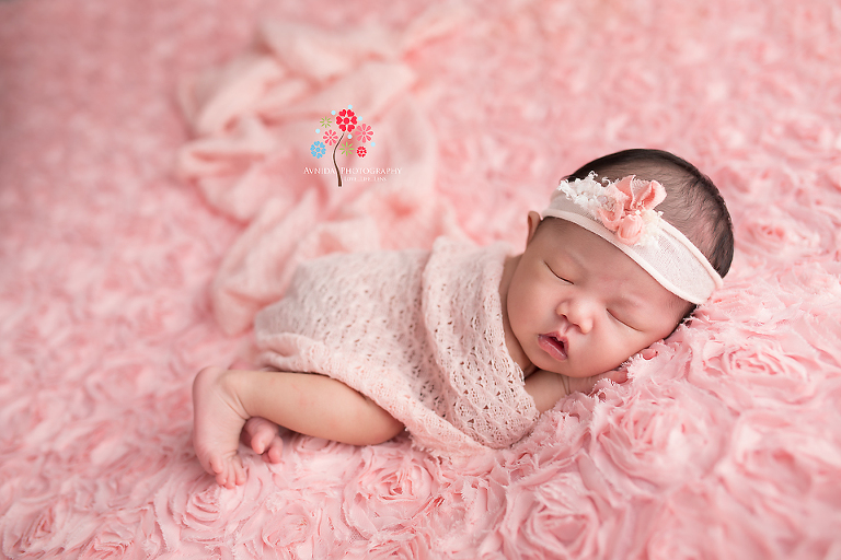 Newborn Photography Lawrenceville NJ - Sleeping on a bed of roses - what else did you expect for a cute baby princess