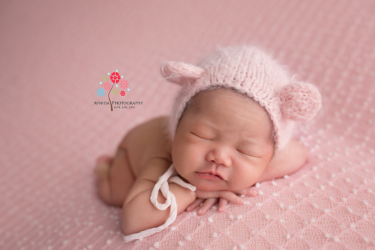Newborn Photography Lawrenceville NJ - This photograph illustrates the point I have repeatedly made in my blog posts about color choices - With the right training and experience, you can transform a simple setup into an awesome photograph