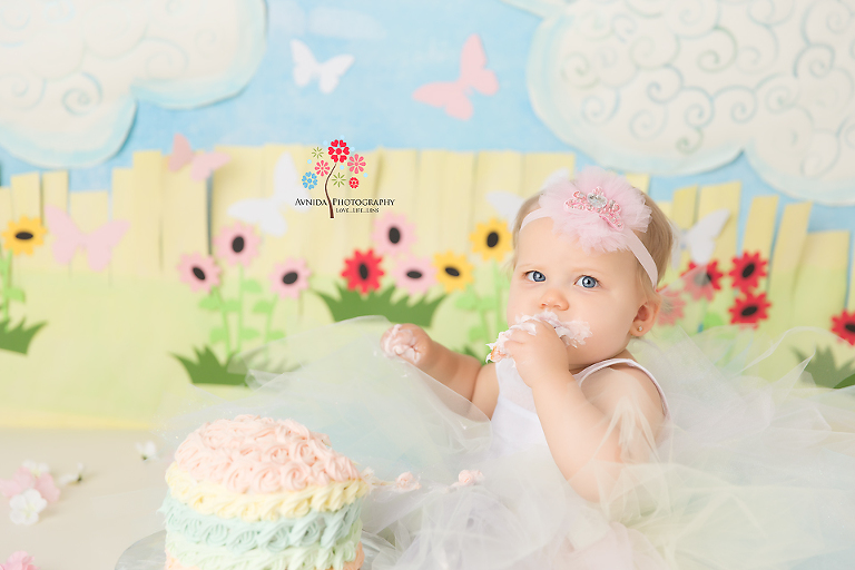 Cake Smash Photographer Rahway NJ - in this magical kingdom, the cake whispered to Baby Grey - Oh sweet princess what a joy to celebrate this awesome day of your first birthday