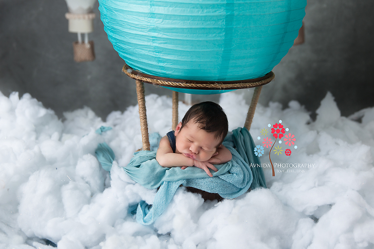 Newborn Photography Red Bank NJ - A nice colorful hot air balloon, and beautiful scenery around him - Baby Grayson feels like he is cloud nine so he decides to take a quick nap