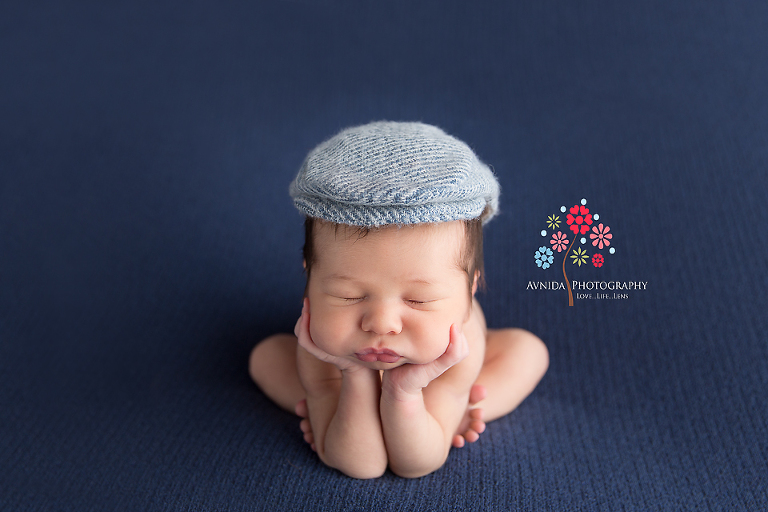 Newborn Photography Red Bank NJ - A slightly different angle for the hands on chin pose - Why am I adding this one - it accentuates those cute baby cheeks