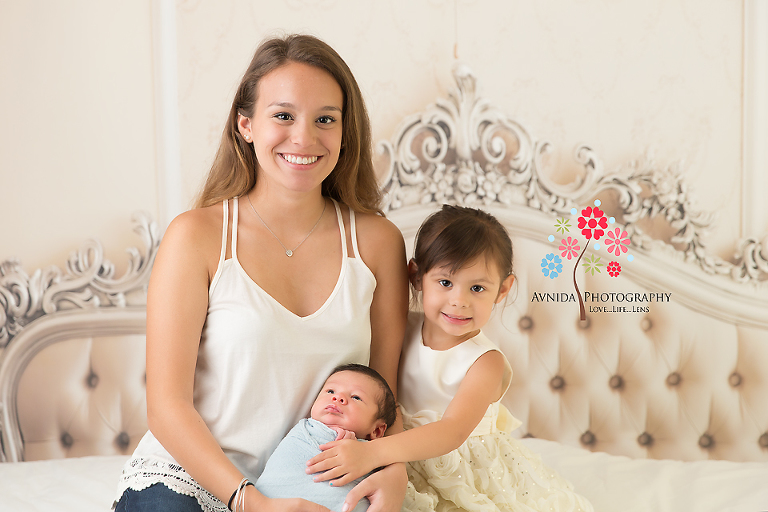 Newborn Photography Red Bank NJ - Baby Grayson along with his elder siblings - two beautiful sisters - we were lucky to these perfect smiles