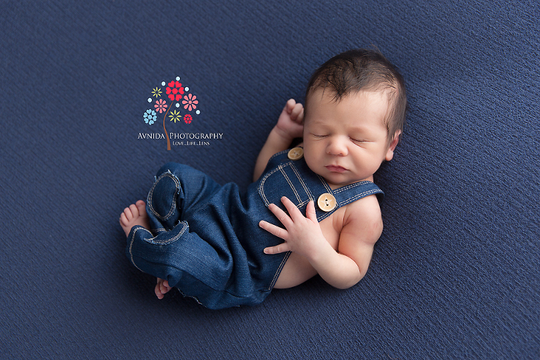 Newborn Photography Red Bank NJ - So remember that Mom said she wanted different shades of blue incorporated in the photos - well turns out the navy blue blanket matched his overall perfectly